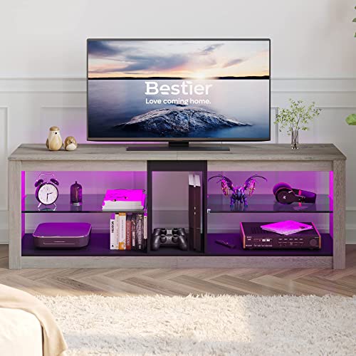 Bestier Soporte de TV RGB para 65+Centro de entretenimiento para juegos LED TV consola consola con 2 estantes de vidrio PS Gaming TV gabinete para sala de estar gris lavado